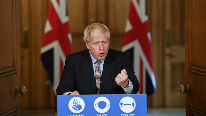 Britain's Prime Minister Boris Johnson speaks during a virtual press conference at Downing Street, London, following the announcement that the legal limit on social gatherings is set to be reduced from 30 people to six.