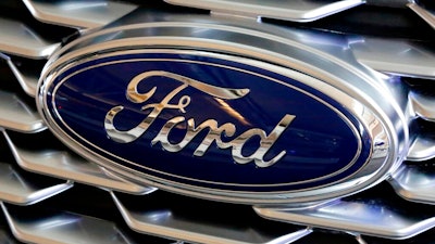 Ford logo on the grill of a 2018 Ford Explorer.