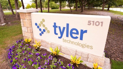 The sign for Tyler Technologies is seen outside the company's offices.