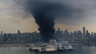 Black smoke rises from a fire at warehouses at the seaport of Beirut, Lebanon.