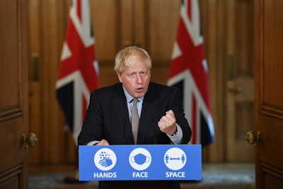 Britain's Prime Minister Boris Johnson speaks during a virtual press conference at Downing Street, London, following the announcement that the legal limit on social gatherings is set to be reduced from 30 people to six.