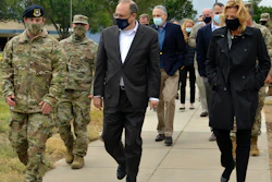 Marshall Billingslea, center, special presidential envoy for arms control, and National Nuclear Security Administration Administrator Lisa Gordon-Hagerty, right, walk with Air Force personnel at Kirtland Air Force Base, Albuquerque, Sept. 9, 2020.