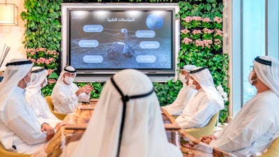 Emirati officials brief Sheikh Mohammed bin Rashid Al Maktoum about a possible moon mission, Sept. 29, 2020, Dubai.
