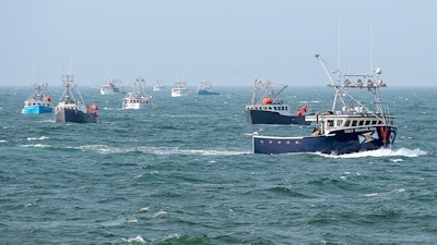 Non-indigenous boats protest the launch of a Mi'kmaq self-regulated fishery by members of the Sipekne'katik First Nation, in Saulnierville, Nova Scotia on Sept. 17.