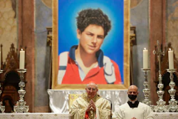 An image of Carlo Acutis shown during his beatification ceremony, celebrated by Cardinal Agostino Vallini, in the St. Francis Basilica, Assisi, Italy, Oct. 10, 2020.