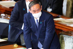 Japanese Prime Minister Yoshihide Suga attends an extraordinary Diet session to deliver his policy speech at the upper house of parliament in Tokyo.