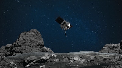This artist’s rendering shows OSIRIS-REx spacecraft descending toward asteroid Bennu to collect a sample of the asteroid’s surface.