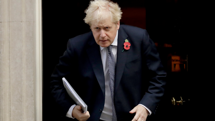 British Prime Minister Boris Johnson leaves 10 Downing Street in London, Nov. 10, 2020.