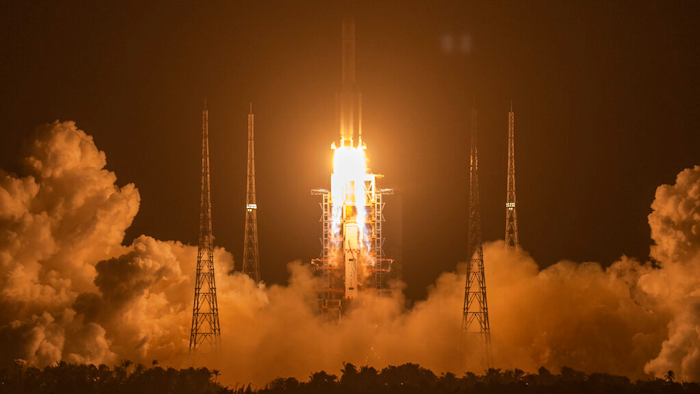 A Long March-5 rocket carrying the Chang'e 5 lunar mission lifts off at the Wenchang Space Launch Center, Nov. 24, 2020.