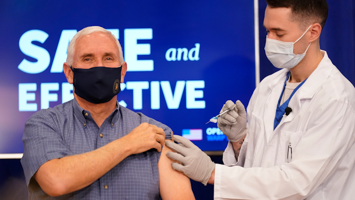 Vice President Mike Pence receives a Pfizer-BioNTech COVID-19 vaccine shot at the Eisenhower Executive Office Building on the White House complex, Friday, Dec. 18, 2020, in Washington. Karen Pence, and U.S. Surgeon General Jerome Adams also participated.