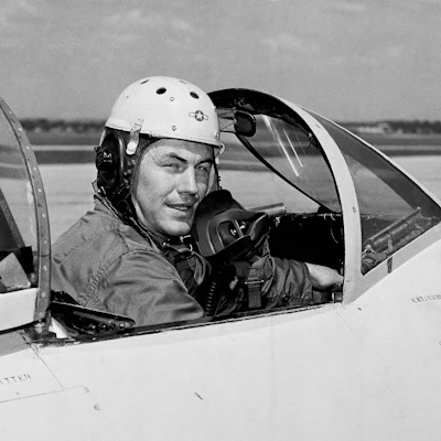In this 1948 file photo, test pilot Charles E. Yeager, 25, poses for a picture in a jet's cockpit.