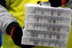 Boxes containing the Pfizer-BioNTech COVID-19 vaccine are prepared to be shipped at the Pfizer Global Supply Kalamazoo manufacturing plant in Portage, Mich., Sunday, Dec. 13, 2020.