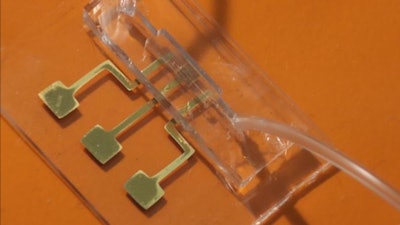 An image of the COVID-19 test chip made by aerosol jet nanoparticle 3D printing.