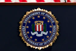The FBI seal seen before a news conference at FBI headquarters in Washington, June 14, 2018.
