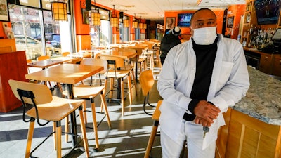 Fusion East Caribbean & Soul Food owner Andrew Walcott at his restaurant in East New York, Brooklyn, Jan. 7, 2021.