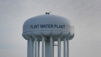 The Flint Water Plant tower is shown in Flint, Mich., Wednesday, Jan. 13, 2021. Some Flint residents impacted by months of lead-tainted water are looking past expected charges against former Gov. Rick Snyder and others in his administration to healing physical and emotional damages left by the crisis.