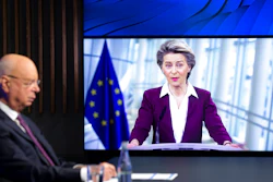 Klaus Schwab, left, executive chairman of the World Economic Forum, listens to European Commission President Ursula von der Leyen at the Davos Agenda in Cologny, Switzerland, Jan. 26, 2021.