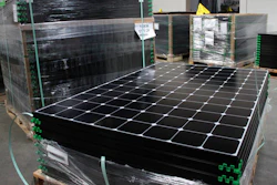 SunPower solar panels stacked in Positive Energy Solar's warehouse, Albuquerque, N.M., March 9, 2016.
