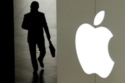 A man leaves an Apple store in Beijing, Jan. 3, 2019.