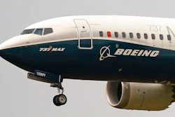 In this Sept. 30, 202, file photo, a Boeing 737 Max jet, piloted by Federal Aviation Administration (FAA) chief Steve Dickson, prepares to land at Boeing Field following a test flight in Seattle.