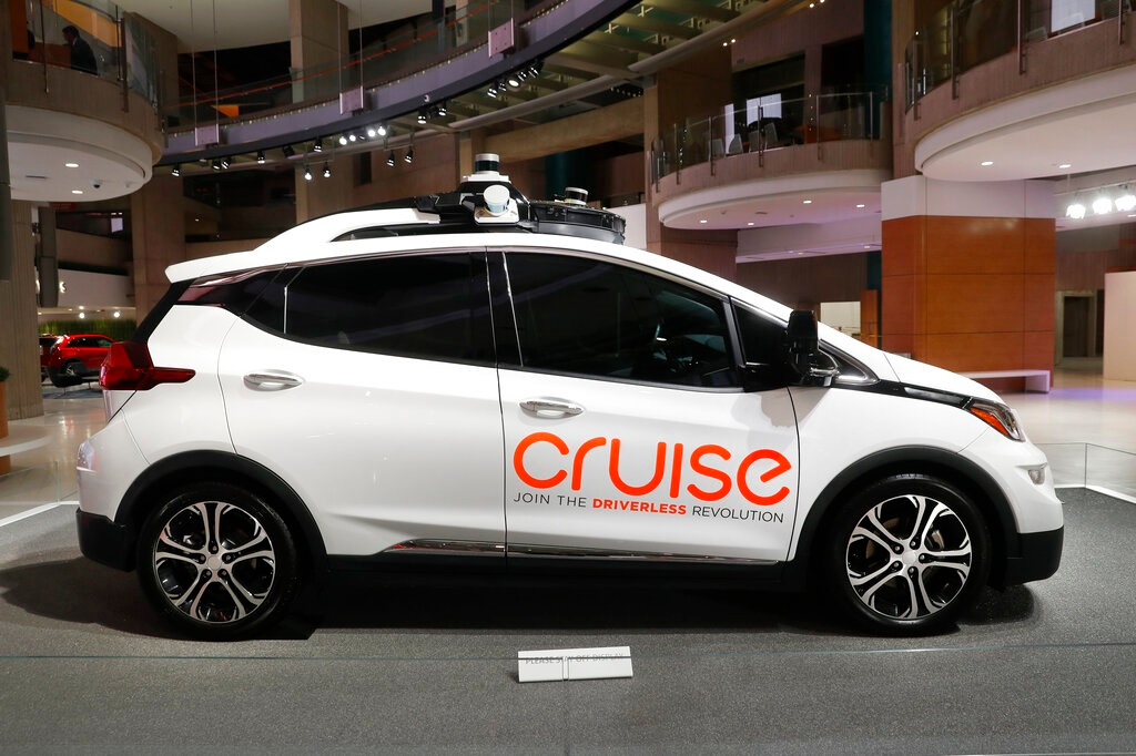 In this Jan. 16, 2019, file photo, Cruise AV, General Motor's autonomous electric Bolt EV is displayed in Detroit. General Motors' self-driving car company is sending vehicles without anybody behind the wheel in San Francisco as it navigates its way toward launching a robotic taxi service that would compete against Uber and Lyft in the hometown of the leading ride-hailing services. The move announced Wednesday, Dec. 9, 2020, by GM-owned Cruise come two months after the company received California’s permission to fully driverless cars in the state.