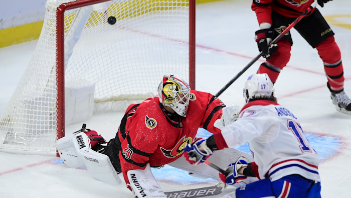 Montreal Canadiens right wing Josh Anderson (17) blasts the puck past Ottawa Senators goaltender Matt Murray (30) during the third period of an NHL hockey game in Ottawa on Saturday, Feb. 6, 2021.