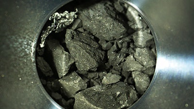Optical microscope photo of soil samples brought back by Hayabusa2, Sagamihara, Japan, Dec. 24, 2020.