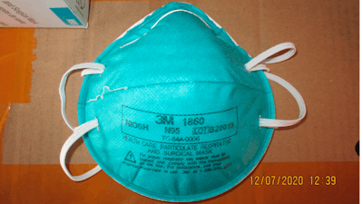 This December 2020 image provided by U.S. Immigration and Customs Enforcement (ICE) shows a counterfeit N95 surgical mask that was seized by ICE and U.S. Customs and Border Protection.