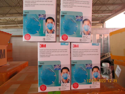 This December 2020 image provided by U.S. Immigration and Customs Enforcement (ICE) shows counterfeit N95 surgical masks that were seized by ICE and U.S. Customs and Border Protection.