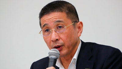 In this Sept. 9, 2019, file photo, then Nissan Chief Executive Hiroto Saikawa speaks during a press conference in the automaker's headquarters in Yokohama, near Tokyo. Former Nissan Chief Executive Saikawa told a Japanese court Wednesday, Feb. 24, 2021, he believed the compensation for his predecessor Carlos Ghosn was too low “by international standards,” and so he supported Ghosn’s retirement packages to prevent him from leaving.
