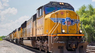 In this July 31, 2018, file photo a Union Pacific train travels through Union, Neb. A federal judge has ruled that the nation's four largest railroads can't exclude details of their conversations from lawsuits challenging billions of dollars of charges the railroads imposed in the past. The ruling on Friday, Feb. 19, 2021, undercuts one of the defenses Union Pacific, BNSF, CSX and Norfolk Southern had offered in dozens of lawsuits major companies filed last year questioning the way railroads set rates.