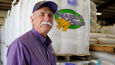 Adrian Polansky, a farmer and former executive director of the USDA’s Farm Service Agency office in Kansas during the Obama administration, stops for a photo while touring his seed processing plant near Belleville, KS on Friday, March 5.