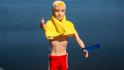 A reproduction of the original Ken doll, launched in 1961 as a companion to Barbie, appears in Bergen County, N.J., on Monday, March 8, 2021. Mattel has put the doll on sale this week to commemorate its 60th anniversary.