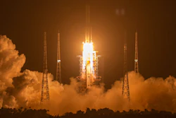 A Long March-5 rocket carrying the Chang'e 5 lunar mission lifts off at the Wenchang Space Launch Center, Nov. 24, 2020.