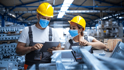 Industrial Workers With Face Masks Protected Against Corona Virus Discussing About Production In Factory People Working During Covid 19 Pandemic 1277323829 2125x1416