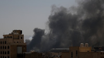Smoke rises after Saudi-led airstrikes on an army base in Sanaa, Yemen. The airstrikes come as retaliation for recent attacks on Saudi Arabia that were claimed by the Iranian-backed rebels.