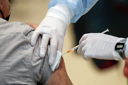 In this file photo, staff members administer the AstraZeneca vaccine at La Nuvola (The Cloud) convention center that was temporarily turned into a COVID-19 vaccination hub in Rome.
