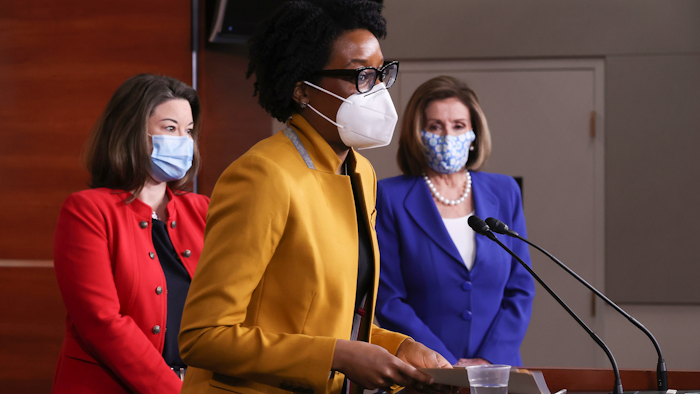 Rep. Lauren Underwood, D-Ill., during a news conference with Speaker Nancy Pelosi, D-Calif., and Rep. Angie Craig, D-Minn., Capitol Hill, March 19, 2021.