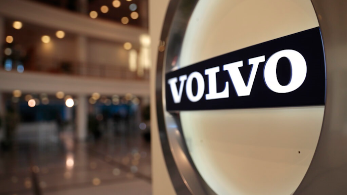 This Feb. 6, 2020 file photo shows The Volvo logo in the lobby of the Volvo corporate headquarters in Brussels. A strike at a Volvo plant in Virginia has ended following a tentative deal between the workers' union and automaker.The UAW Volvo Truck Council said Friday, April 30, 2021, that Volvo Truck workers will be scheduled to return to their regular shifts on Monday.