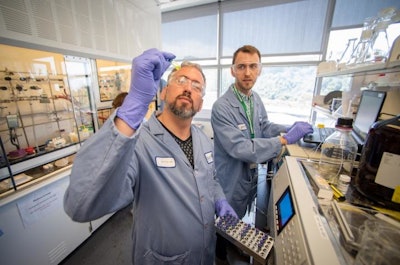 Brett Helms, foreground, in the Molecular Foundry in 2019.