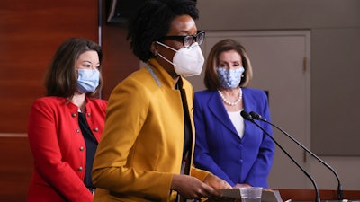 Rep. Lauren Underwood, D-Ill., during a news conference with Speaker Nancy Pelosi, D-Calif., and Rep. Angie Craig, D-Minn., Capitol Hill, March 19, 2021.