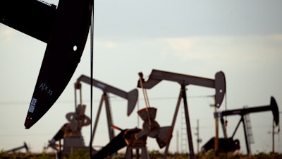 Pumpjacks in a field near Lovington, N.M., April 24, 2015.