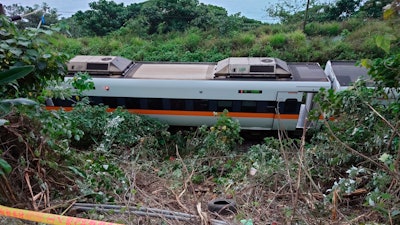 A section of a derailed train cordoned off near the Taroko Gorge, Hualien, Taiwan, April 2, 2021.