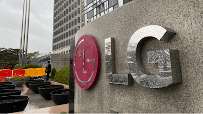 A logo of LG Electronics Inc. is seen outside of the company's office building in Seoul, South Korea, Monday, April 12, 2021. South Korean President Moon Jae-in on Monday welcomed a decision by two South Korean electric vehicle battery makers to settle a long-running intellectual property dispute that had threatened thousands of American jobs and President Joe Biden's environmental policies.