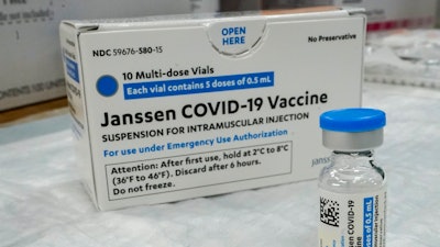 In this Thursday, April 8, 2021 file photo, the Johnson & Johnson COVID-19 vaccine sits on a table at a pop up vaccinations site the Albanian Islamic Cultural Center, in the Staten Island borough of New York. The U.S. is recommending a “pause” in administration of the single-dose Johnson & Johnson COVID-19 vaccine to investigate reports of potentially dangerous blood clots.