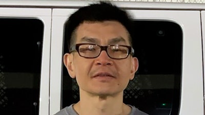 This undated photo provided by U.S. Immigration and Customs Enforcement (ICE) shows Indonesian citizen Rudy Kurniawan. Kurniawan, who bilked wine collectors out of millions by selling cheaper hooch he relabeled in his kitchen has been deported to his native Indonesia. U.S. immigration officials say Kurniawan was deported last week from Dallas/Fort Worth International Airport to Tangerang City.