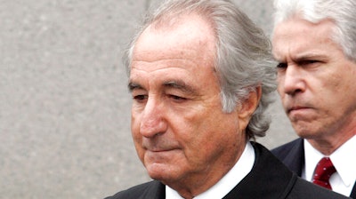 Bernie Madoff leaves federal court in Manhattan, March 10, 2009.