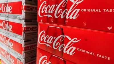 In this April 5 photo, cases of Coca-Cola are displayed in a supermarket in New York.