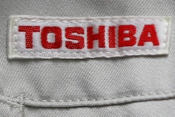Toshiba Corp. logo on a worker's jacket, Yokosuka, Japan, June 15, 2017.