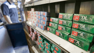 This May 17, 2018 file photo shows packs of menthol cigarettes and other tobacco products at a store in San Francisco. U.S. health regulators will announce a new effort Thursday, April 29, 2021, to ban menthol cigarettes, according to an Biden administration official.